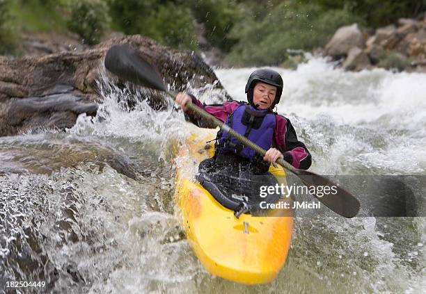 woman white water kayaking - white water kayaking stock pictures, royalty-free photos & images