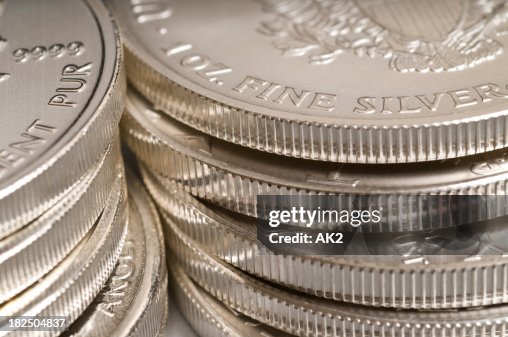 Piles of silver coins Piles of silver coins
