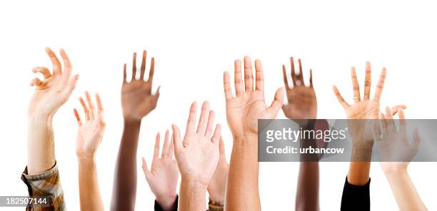 raised hands - arms raised stock pictures, royalty-free photos & images