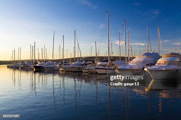 marina at sunset - marina stock pictures, royalty-free photos & images