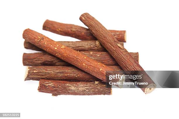 licorice root, isolated - licorice stock pictures, royalty-free photos & images