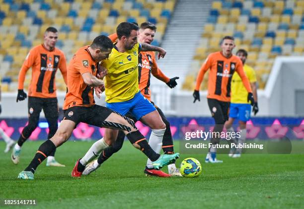 Players of FC Shakhtar Donetsk and FC Metalist 1925 Kharkiv are seen in action during the 2023/2024 Ukrainian Premier League 16th Round game at the...