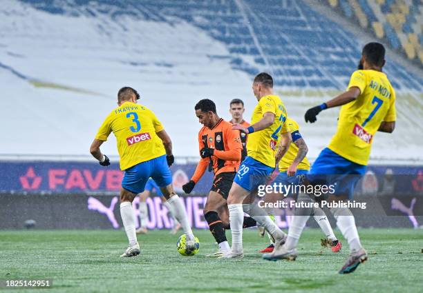 Players of FC Shakhtar Donetsk and FC Metalist 1925 Kharkiv are seen in action during the 2023/2024 Ukrainian Premier League 16th Round game at the...