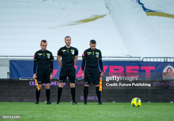 Referees are seen on the pitch before the start of the 2023/2024 Ukrainian Premier League 16th Round game between FC Shakhtar Donetsk and FC Metalist...