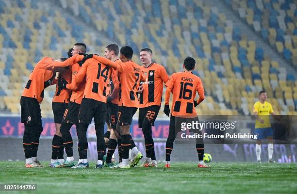 Players of FC Shakhtar Donetsk hug during the 2023/2024 Ukrainian Premier League 16th Round game against FC Metalist 1925 Kharkiv at the Arena Lviv....