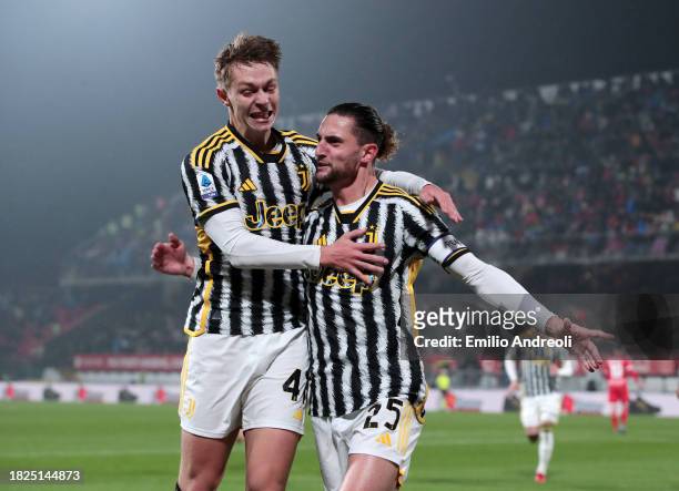 Adrien Rabiot of Juventus celebrates with Hans Nicolussi Caviglia of Juventus after scoring the team's first goal during the Serie A TIM match...