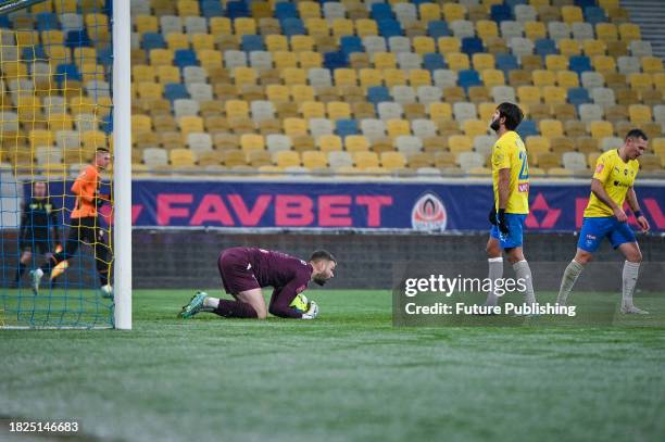 Goalkeeper of FC Metalist 1925 Kharkiv Denys Sydorenko makes a save during the 2023/2024 Ukrainian Premier League 16th Round game against FC Shakhtar...