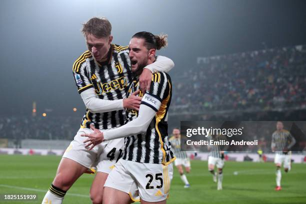 Adrien Rabiot of Juventus celebrates with Hans Nicolussi Caviglia of Juventus after scoring the team's first goal during the Serie A TIM match...