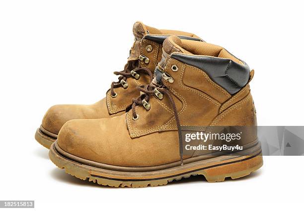 work boots - shoe covers stock pictures, royalty-free photos & images