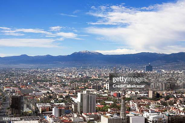 skyline view of mexico city on a sunny day - mexico skyline stock pictures, royalty-free photos & images