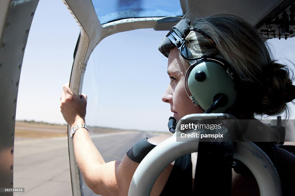 Adventurous Woman in Helicopter