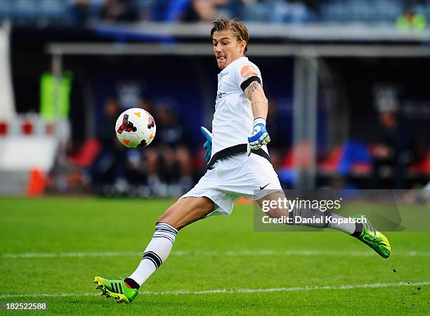 Jan Zimmermann of Darmstadt kicks the ball during the third Bundesliga match between 1. FC Saarbruecken and Darmstadt 98 on September 28, 2013 in...