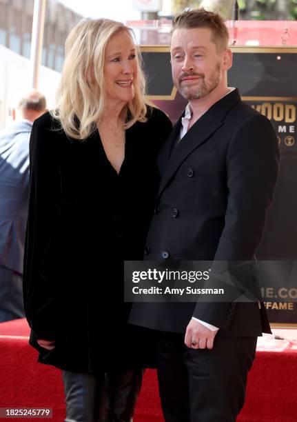 Catherine O'Hara and Macaulay Culkin attend the ceremony honoring Macaulay Culkin with a Star on the Hollywood Walk of Fame on December 01, 2023 in...