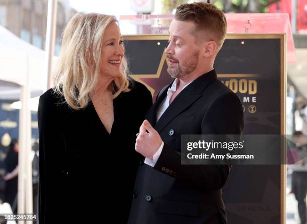 Catherine O'Hara and Macaulay Culkin attend the ceremony honoring Macaulay Culkin with a Star on the Hollywood Walk of Fame on December 01, 2023 in...