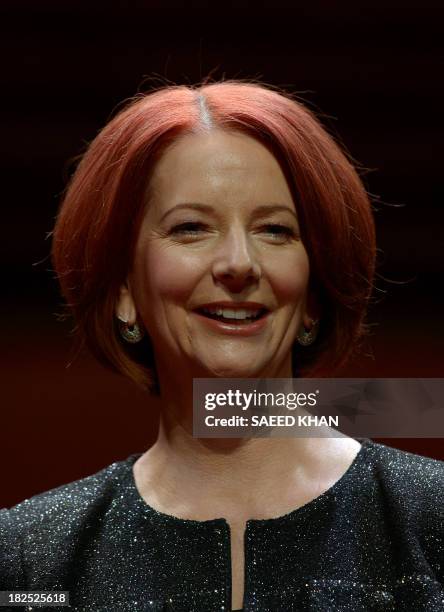 Australia's former prime minister Julia Gillard poses for a photographs prior to a televised interview in front of a live audience at the Sydney...