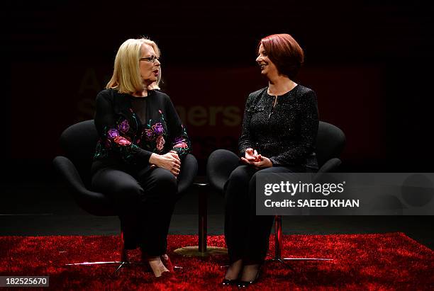 Australia's former prime minister Julia Gillard talks with author Anne Summers prior to a televised interview at the Sydney Opera House on September...