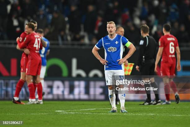 Fabian Holland of SV Darmstadt 98 looks dejected following the Bundesliga match between SV Darmstadt 98 and 1. FC Köln at Merck-Stadion am...