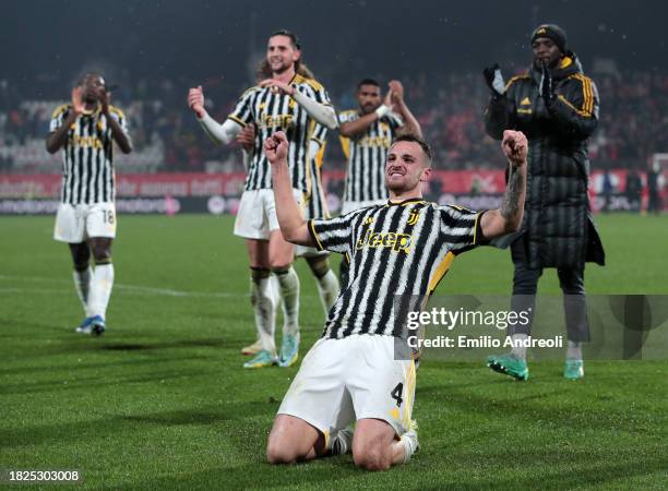 Federico Gatti of Juventus celebrates victory at full-time following the Serie A TIM match between AC Monza and Juventus at U-Power Stadium on...