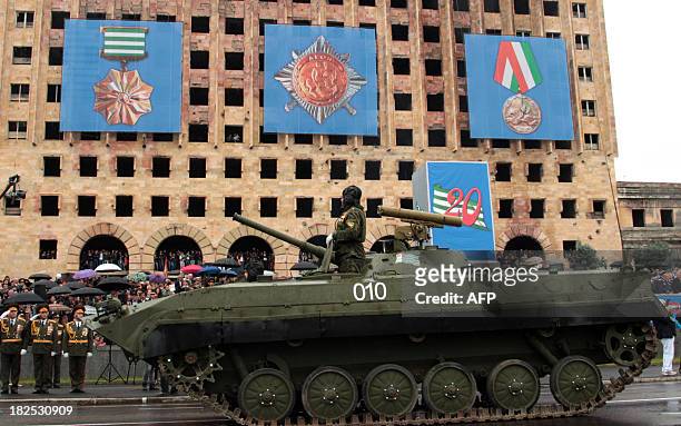 Soviet-build infantry fighting vehicle, BMD-1, of Abkhazian armed forces rolls during a military parade to mark the 20th anniversary of Georgia's...