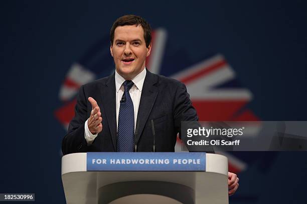 Chancellor of the Exchequer George Osborne delivers his speech in the main hall on the second day of the Conservative Party Conference on September...
