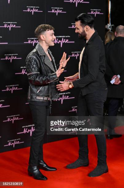 Olly Alexander and Rylan Clark attend 'An Audience With Kylie' at The Royal Albert Hall on December 01, 2023 in London, England.