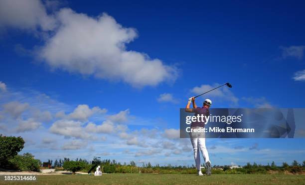 Justin Thomas of the United States plays his shot from the 14th tee during the second round of the Hero World Challenge at Albany Golf Course on...