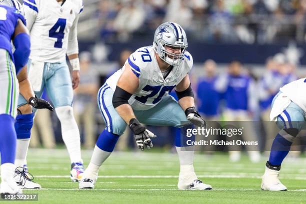 Zack Martin of the Dallas Cowboys lines up during an NFL football game between the Dallas Cowboys and the Seattle Seahawks at AT&T Stadium on...