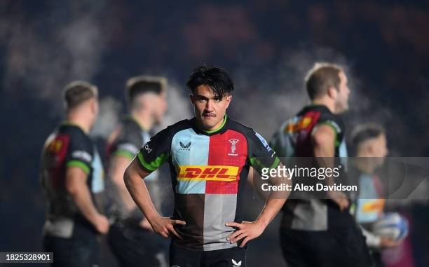 Marcus Smith of Harlequins looks on during the Gallagher Premiership Rugby match between Harlequins and Sale Sharks at The Stoop on December 01, 2023...