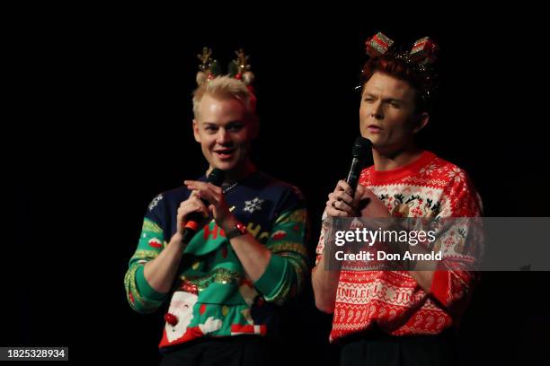 Joel Creasey and Rhys Nicholson perform on stage during "Rhys & Joel's Family Christmas" at Enmore Theatre on December 01, 2023 in Sydney, Australia.