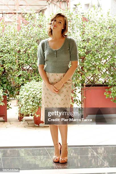 Actress Micaela Ramazzotti attends an "Anni Felici" photocall at hotel Baglioni on September 30, 2013 in Milan, Italy.