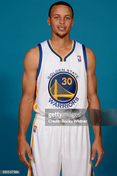 Stephen Curry poses for a photo on Golden State Warriors media day held September 27, 2013 at the Warriors practice facility in Oakland, California....