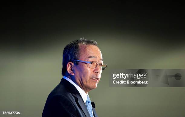 Takeshi Uchiyamada, chairman of Toyota Motor Corp., speaks to the Economic Club of Washington in Washington, D.C., U.S., on Monday, Sept. 30, 2013....