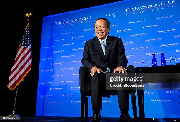 Takeshi Uchiyamada, chairman of Toyota Motor Corp., laughs during an Economic Club of Washington event in Washington, D.C., U.S., on Monday, Sept....
