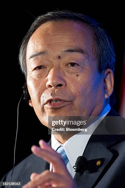 Takeshi Uchiyamada, chairman of Toyota Motor Corp., speaks to the Economic Club of Washington in Washington, D.C., U.S., on Monday, Sept. 30, 2013....