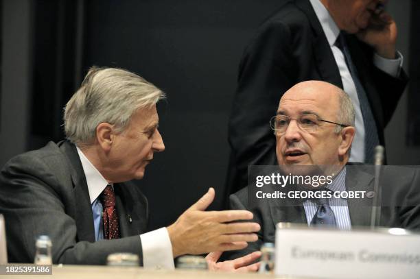 President of the European Central Bank French Jean Claude Trichet confers with commisisioner responsable of Economy and Monetary Affairs Joaquin...