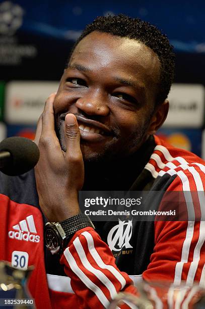 Goalkeeper Steve Mandanda of Olympique Marseille reacts during a press conference ahead of their Champions League match against Borussia Dortmund on...