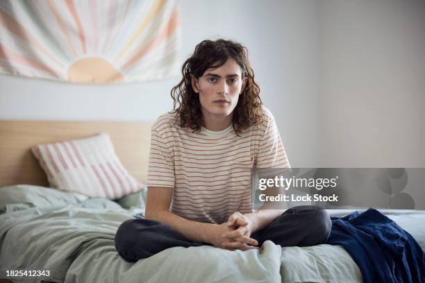 college student on bed - independence community college stock pictures, royalty-free photos & images