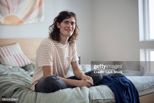 college student on bed - independence community college stock pictures, royalty-free photos & images