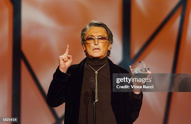 Producer Robert Evans accepts an award during the 14th Annual Producers Guild Awards at the Century Plaza Hotel on March 2, 2003 in Los Angeles,...