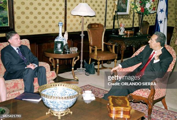 President of Honduras Carlos Flores converses with Director of International Monetary Fund Horst Koehler 18 May, 2000 in the president's house in...