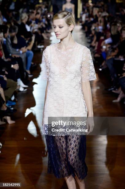 Model walks the runway at the Stella McCartney Spring Summer 2014 fashion show during Paris Fashion Week on September 30, 2013 in Paris, France.
