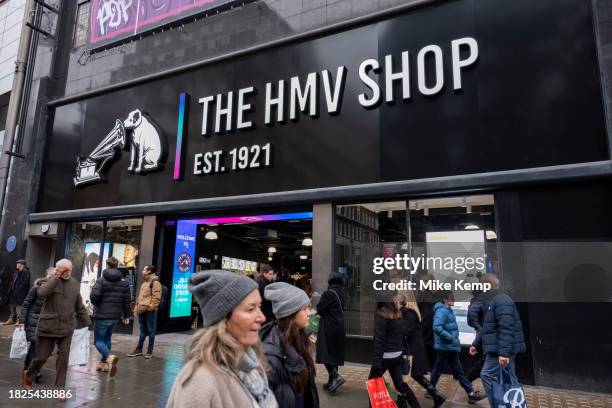 New signage outside the recently reopened flagship HMV store on Oxford Street as the famous His Masters Voice sign is hidden again following a period...