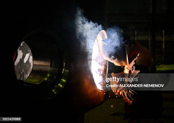 Worker does welding on a part of a RITM-200 nuclear reactor, the latest reactor for the icebreaker fleet, at ZiO-Podolsk Machine-Building Plant, an...