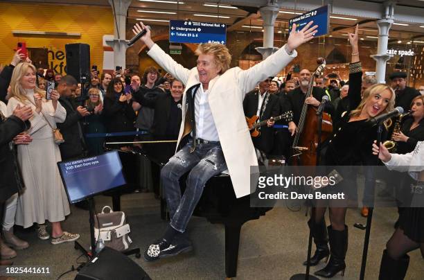Sir Rod Stewart performs a surprise gig at St Pancras Station to celebrate the launch of their upcoming album "Swing Fever" as wife Penny Lancaster...