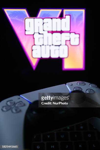 Logo from the trailer displayed on a laptop screen and PlayStation DualSense controller are seen in this illustration photo taken in Krakow, Poland...