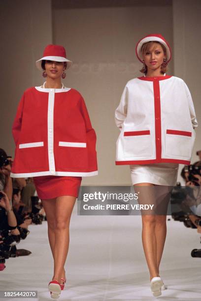 Model displays on June 8, 1993 an outfit jointly created by Jean-Charles de Castelbajac and André Courrèges during the presentation of the...