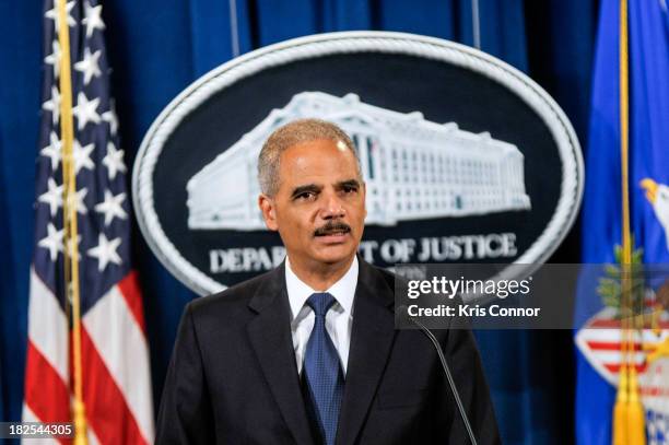 Attorney General Eric Holder speaks during a press conference announcing Department of Justice plans to sue North Carolina over Voter ID regulations...