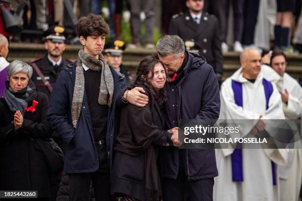 Gino Cecchettin , Elena Cecchetin and Davide Cecchettin , respectively father, sister and brother of Giulia Cecchettin, a university student killed...