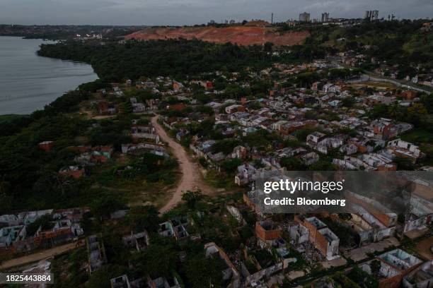 Braskem's operating area behind a destroyed neighborhood that was evacuated due to the risk of the ground sinking in Maceio, Alagoas state, Brazil,...