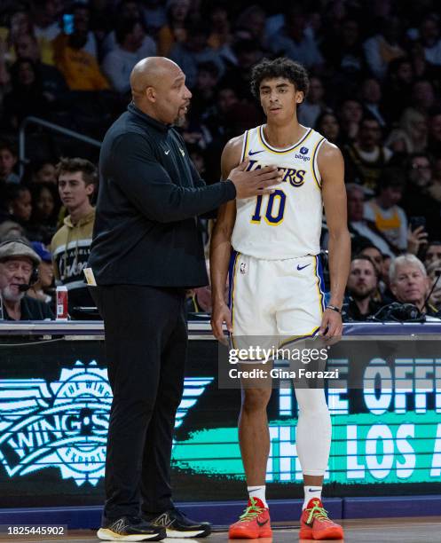 Los Angeles Lakers head coach Darvin Ham chats with Los Angeles Lakers guard Max Christie during the game against the Houston Rockets at Crypton.com...